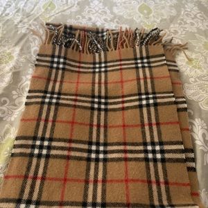 Burberry (not sure if it’s real)plaid scarf in woo